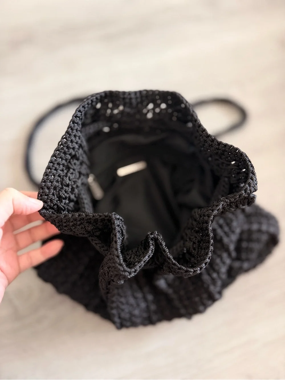 The Sak Black Crochet Drawstring Backpack Shoulder Bag